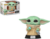 Star Wars: The Mandalorian The Child - Baby Yoda - Grogu with Cookie Funko Pop en caja